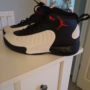 Jordan Black and White Athletic Shoes with Red Accents